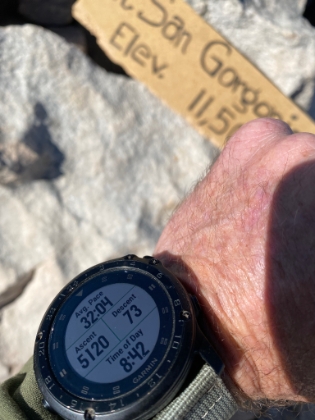 Made it to the top in 5:03. The last couple miles were a grind, and I hadn't seen a single person until just below the summit. But I had the summit to myself. There was a cold, howling wind though, so I couldn't have stayed long even if I had wanted to.