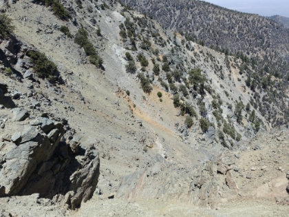 Made it up to the Backbone Trail at 9,300'. There are some epic dropoffs here. My plan was to hike back to the ski boundary, though I wasn't sure exactly what the distance and extra gain would be.