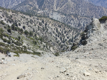 Me on the ledge looking down. It didn't bother me as much as the first time I was here, but it's still tough to look down here. I noticed that most people crossing never took their eyes off their feet.