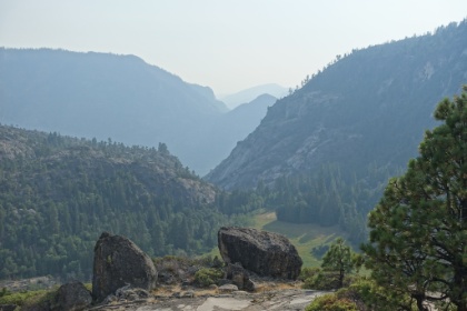 The day was starting to get late, and it was time to look for a campsite. We had passed-up some options a couple miles back, but now there was nothing but rocky switchbacks. The sounds of thunder meant another afternoon storm was moving-in. We debated about trying to make it down to the valley floor, but ultimately decided to find a spot asap. We almost ended-up camping right on the trail in one of the switchback turns. Then at the last minute, we found a great outcropping hanging over the valley.