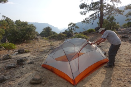 Dad helping setup the tent at our excellent campsite. We were hoping to go without the rainfly tonight.
