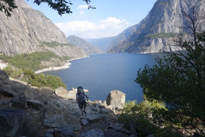 Dad in the final stretch. You can see where the trail passes through the tree line along the rim of the lake. What we were hoping would be flat trail along the lake turned out to be some fairly steep, rolling ups and downs.