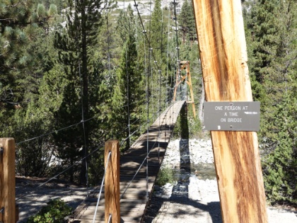 Hmm.... "One person at a time on bridge". They didn't have one of these signs on the other side. No wonder it was swaying so much!