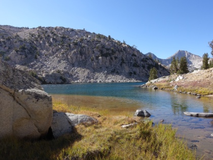 On our way back now. We stop at the previous lakes and decide to go off-trail and walk across the narrow isthmus between the lakes.