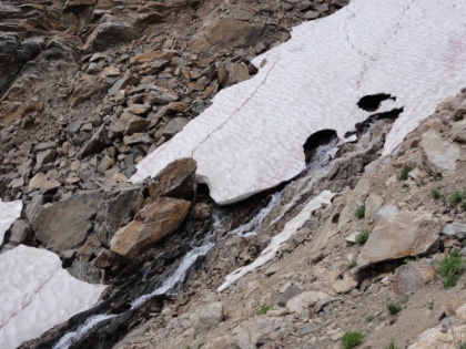 Creeks start out of nowhere from within a snow field and then collect into large streams cascading down the aptly named Cascade Canyon.