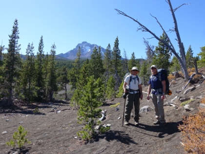 A group of four college-aged backpackers started the loop just after us, and we leap-frogged back and forth with them for most of the first day. They snapped a picture for us here in front of the Middle Sister. They were the only people we saw past North Matthieu Lake that day.