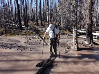 Dr. Rock crossing Soap Creek. He doesn't exactly love creek crossings.