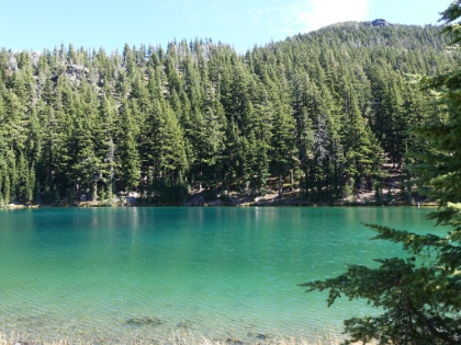 These lakes are definitely green. As green as Crater Lake is blue. I'm assuming it's also because of the mineral content.