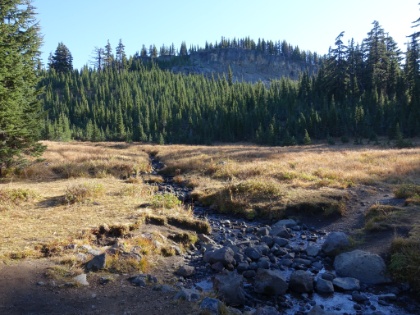 Glacier Creek. Fortunately glacier fed, so it flows year round. It's my last chance at water for the night. I filter a full load and, like the night before, hike the rest of the way carrying almost 6 liters total. At least that way I don't have to worry about having water where I camp and should have enough to get through dinner and then breakfast tomorrow. I continued hiking out of the Obsidiean Limited Entry Area, and to the base of Opie Dilldock Pass, and then called it a night around 5:00pm.