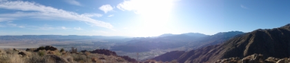 Panorama overlooking the desert floor from a few thousand feet up.