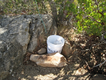 Free water. I guess this is where hikers leave extra water for the less fortunate. Good thing I wasn't desperate for water, because it's empty.
