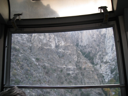Another look out the tram window, this time back towards the mountain.