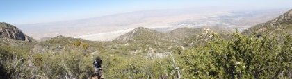 The trail is starting to get steep, but Dad keeps powering along. Palm Springs is now over 6000' below.   View Full Size