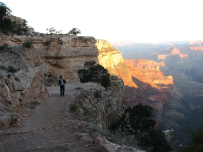 Away I go. It's the last time I see my Dad before I turn the corner and am gone for the rest of the day. Official departure time: 5:53am. While the trail is entirely runnable, the steep downhill is tough on the body. I prefer getting warmed-up on uphill first before hitting the downhill. And that's the way most of my training runs and races are.  But R2R2R is reversed; you start with a 5000' (steep) downhill on the South Kaibab trail before climbing 6000' up North Kaibab on the other side. It's pretty much an upside-down mountain. In fact  kaibab  means "mountain lying down" in the language of one of the local Native American tribes.