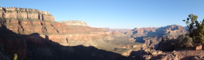 The trail heads down the east side of O'Neill Butte as it drops deeper into the canyon.   View Full Size