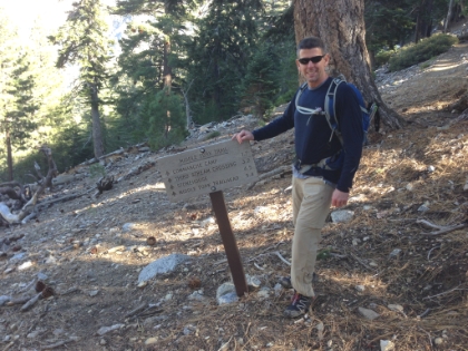 Dad's picture of me at the saddle. We had only seen one pair of backpackers the whole way up. But just sitting on the saddle for a while, we see ten times that many. All had come up the popular side from the West. Definitely good validation that we had chose the better trail for the day!