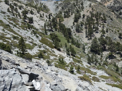 Srambling through the steep section along the bottom of the bowl almost back to the Ski Hut.