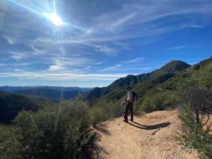 Heading-up the well groomed trail up to the saddle.