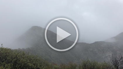I love the look of the clouds blowing up and over the ridge.
