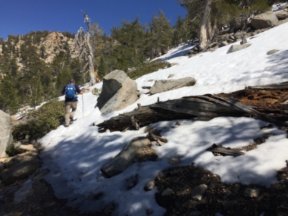 Dad's picture of me heading out. I ended-up losing the trail in the snow just a couple hundred yards further. I had to resort to pulling out the topo map and picking a route towards the summit. It looked like a shorter but steeper route than the actual trail. As it turns out, it was also probably through the deepest snow area on the North face of the peak. Not great route planning by me for sure.