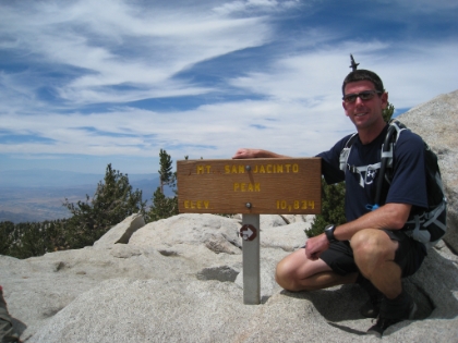 One good thing about summitting on a nice summer day is that there are plenty of people there to take a picture of you.