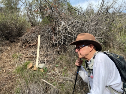 Made it to one of the famous stick signs. This is as far as the trail maintenance group had opened the trail. It would be just following the creek bed from here on.