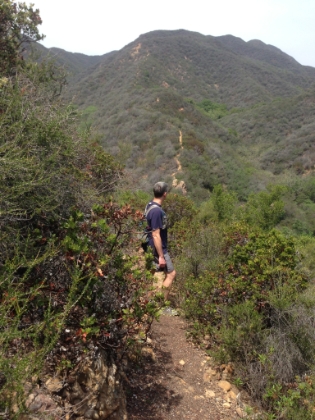 Dad's picture of me looking at the trail climbing steeply up the ridge.