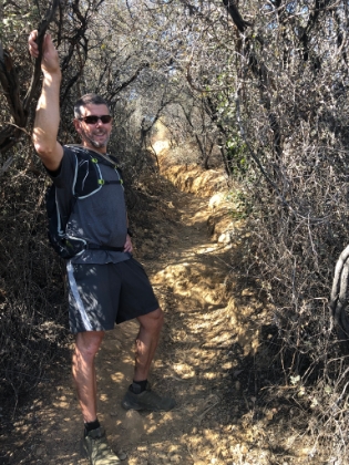 Dad's photo of me heading up through the chapparal.