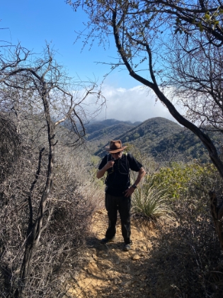 Dad taking a quick break. There had been perfect blue skies all day so far, but now a cloud bank is blowing in.