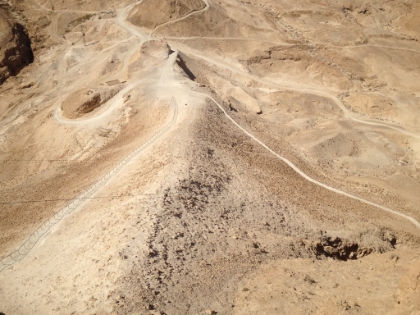 After a long seige (history says 2-3 months, legend says years), the Romans built a huge seige ramp to reach the fortress entrance high up the cliff walls. The Roman Legion X, led by Lucius Flavius Silva, ultimately captured the city. But the 900+ inhabitants had commited mass suicide rather than be captured. The last few people wrote their names on shards of pottery and then drew shards to determine who would be the last alive to kill the second to last and then kill himself. It's a story that has taken on great signficance to the Jews as a symbol of their struggles.