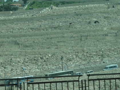 After driving down the Mount of Olives into the Kidron Valley, we head up the other side into Old Jerusalem. Here's a look back at the cemetary and tombs through the car window.