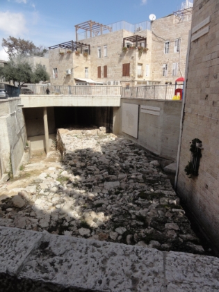 An escavated portion of a previous generation of the Old Wall. The wall around the city has been destroyed and rebuilt several times as just about every major empire has conquered and razed the city over the last few thousand years.