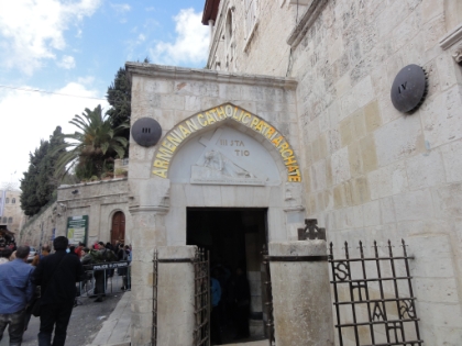 Inside the Christian Quarter, we walk along the Via Dolorosa. This is the path that Jesus walked carrying his cross from  where he was imprisoned at Antonia Fortress to where he was crucified on Golgotha. There are a total of 19 stations marking significant events along the route. Recent archaeology has shown that the traditional path may be slightly off from the actual path followed, but this path retains its tradition. It is also now believed that prisoners that were crucified in the day walked with the horizontal crossbeam and then were attached to the vertical post at the location of crucifixion. Station III seen here is the location that Jesus first fell bearing the weight of the cross. Station IV is said to be where he first saw his mother Mary along the route.