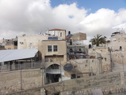 Low income residences nestled amidst some of the most religious sites on earth.