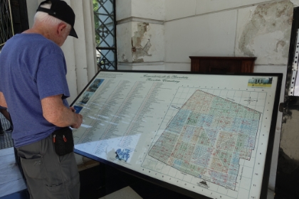 After the long flight from Orange County by way of Dallas, we were met at the airport by our private tour guide Marina. She suggested we explore the Recoleta Cemetery on our own that afternoon. So we did. Here Dad is looking at the map of the almost 5,000 vaults in the cemetery.