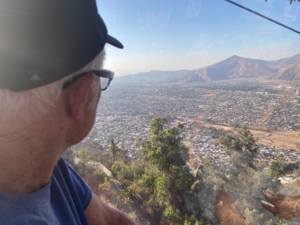 Dad checking out the view from the gondola on the way down. Santiago is a huge, sprawling, dense city.