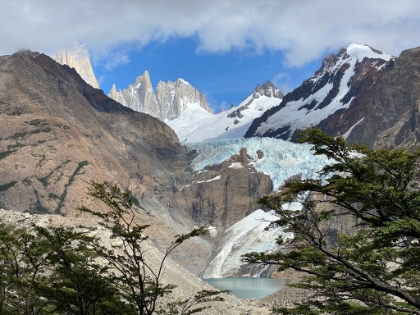 We quickly encounter amazing lookouts of the Piedras Blancas glacier and Laguna de Piedras Blancas below. Our guide shows us pictures of what this view looked like almost 100 years ago with the glacier solid all the way down to the lake. The unfortunate effects of climate change.