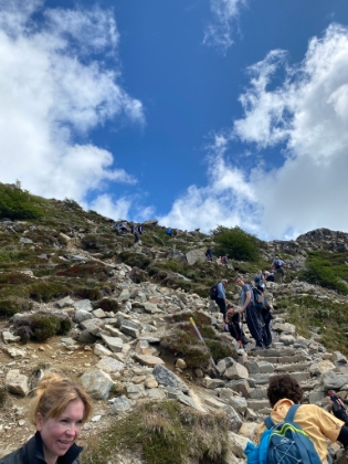 The rock stairs heading to the top.