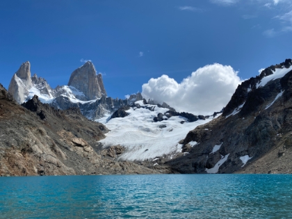 The view from lake level. The glacier is receding but is still amazing.The amount of snow is impressive considering we're here in late Summer. This view is often completely covered in clouds, and the wind so strong you can't stand here for long. We were blessed with absolutely perfect weather today!