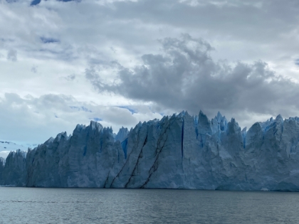 The face of the glacier averages 240 feet above the surface of the lake, and extends over 300 feet below the surface.