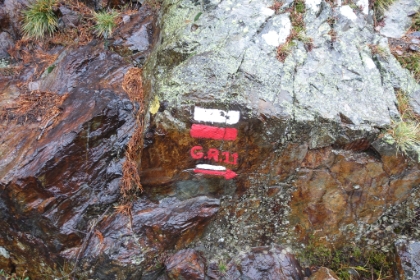 This trail is part of the GR11, the equivalent of the PCT on the Iberian pennisula. It goes from the Atlantic to the Mediterranean on the Spanish side of the Pyrenees. The more well known GR10 does the same thing on the French side. Same as in Israel, trails are marked with painted stripes in different colors depending on the trail.