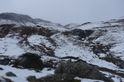 Three roaring cascades running in parrallel down the canyon wall. Unfortunately, my camera is starting to fog up again in the rain and snow.