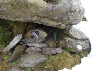 A dry spot behind a snowdrift and a momento that someone has left. I'm not sure if I should consider it inspiring or ominous.