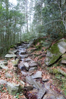 Any hopes of a clear day are over as the rain starts to pickup again. As with Gavarnie, there are no culverts, and the trails quickly turn into cascades. Which of course makes them even more fun!
