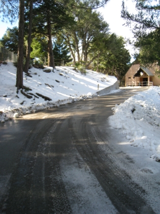 The roads are covered in black ice, almost more dangerous than the trails. It's cold up here. It was in the low 40s at the trailhead, so I'm guessing it must be 30s now. I am of course in my standard shorts and long sleeve tech shirt. Fortunately I had brought my light running gloves and beanie "just to be safe".
