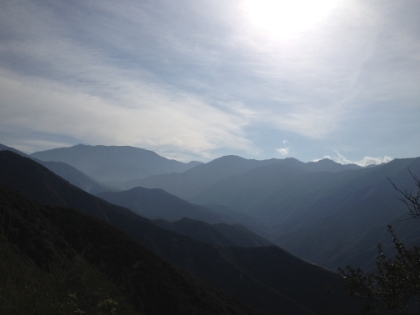 Headed up the Heaton Flats trail to Heaton Saddle. I had been here exactly one week earlier and went about half way. Today the plan was to finish the job. It's a beautiful morning with a slight chance of snow in the afternoon. I'm not quite sure what to expect in terms of weather, snow on the trail, etc., so I have more gear packed than normal. Though trivial compared to heavy backpacking gear, it's still probably the most weight I've ever tried to run with.
