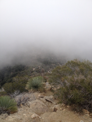 Looking down at the saddle. The clouds help give it a little sense of scale. It's something like a 500' drop here in a few hundred yards.