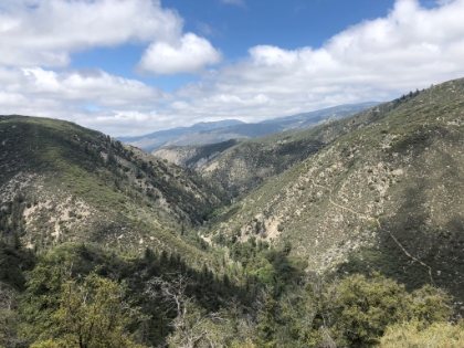 A little better lighting on the valley on the way back. You can see the trail winding down to the bottom on the other side.