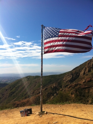 I'm not sure what peak this is, but it's complete with a summit flag and sign-in box. It's not much of a climb to this point though.