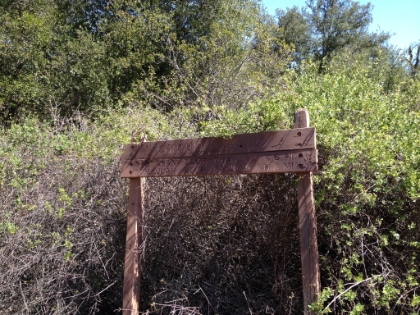 I question the accuracy of these signs. My GPS is actually showing much less distance from the trail head.